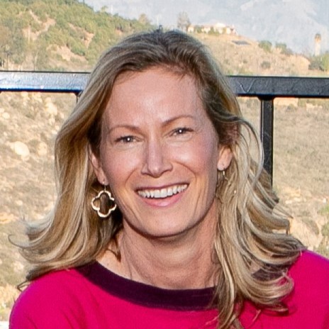 headshot of a smiling woman