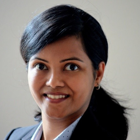 headshot of a smiling woman